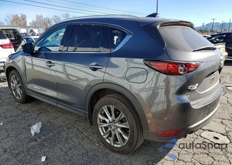 2019 Mazda Cx-5 Signature z USA, uszkodzony, nr VIN JM3KFBEY3K0531883